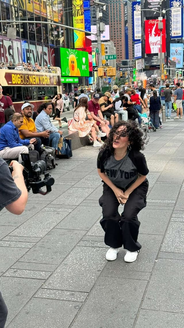 Ali dancing in the middle of Times Square